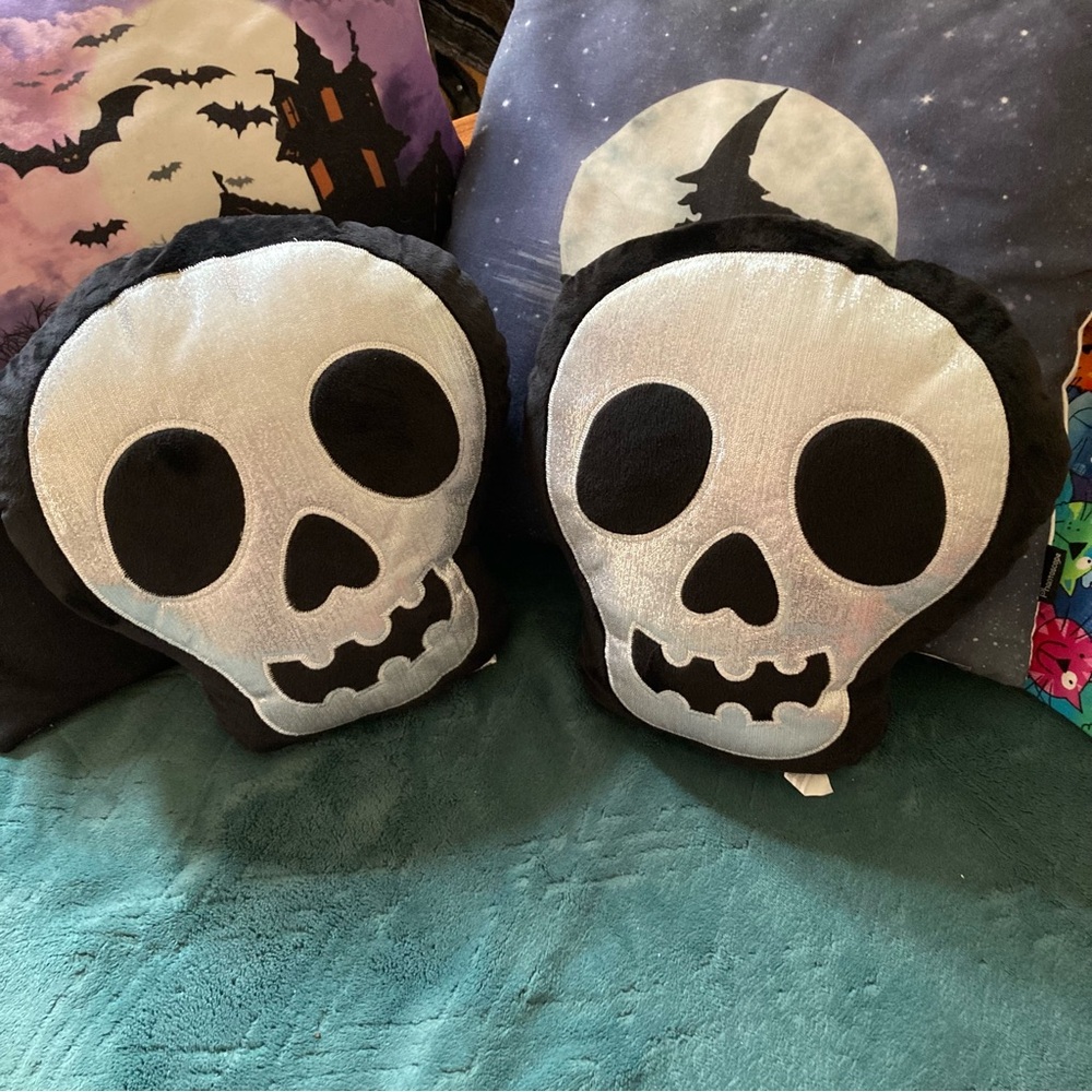 (2) Skull Shaped Black and Silver Pillows